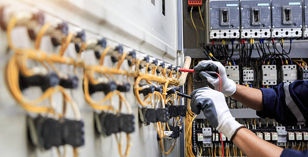 Professional Electrician technician working in Mart, TX